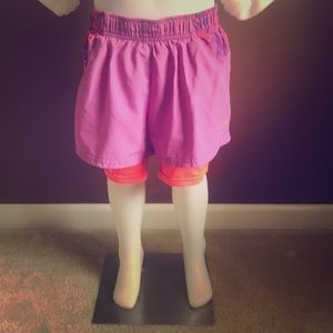 Orange and purple athletic shorts